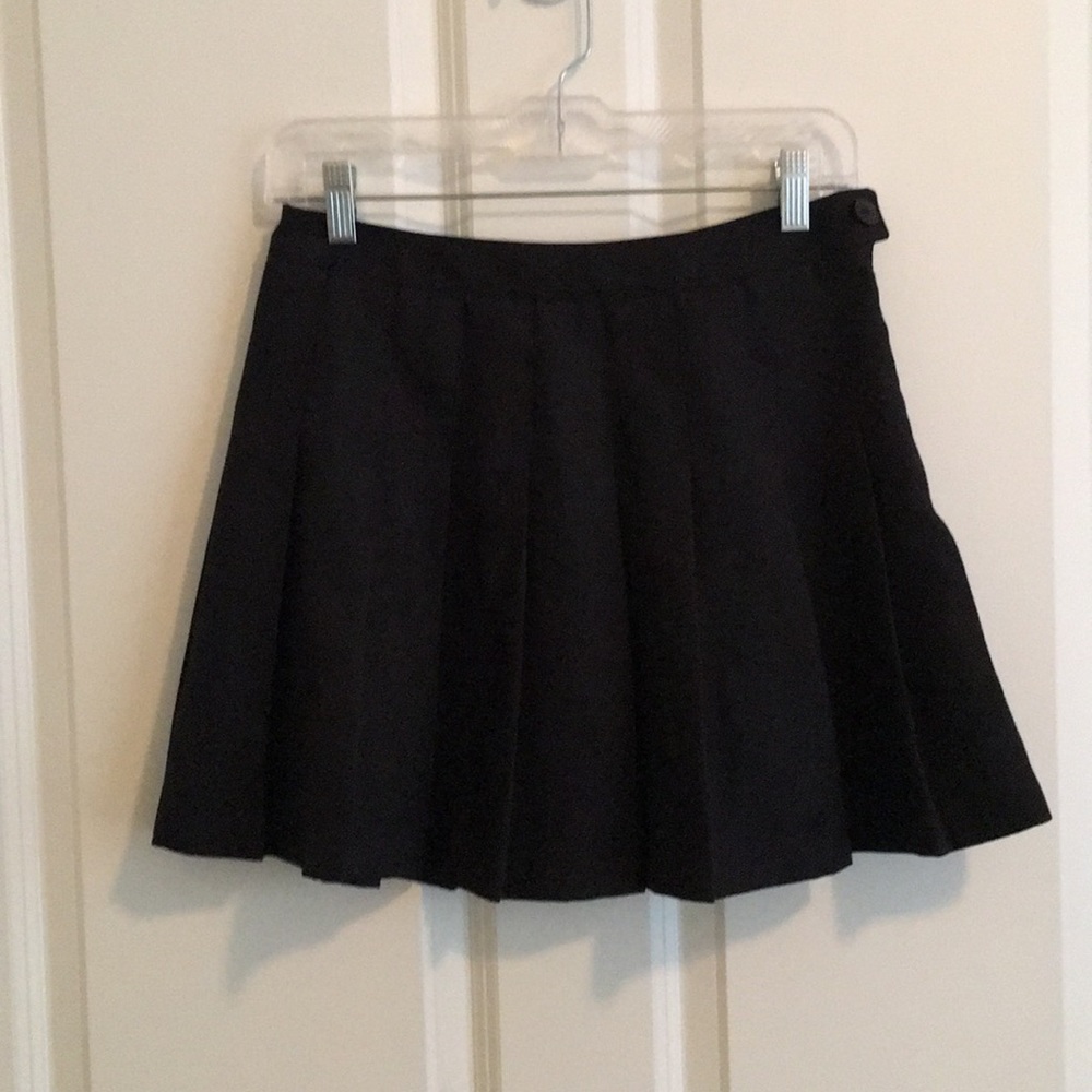 Pleated black miniskirt